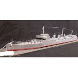 A scratch built waterline model of an early 20th Century wooden dreadnought battleship.