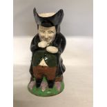 The Snuff Taker toby jug (circa 1900).