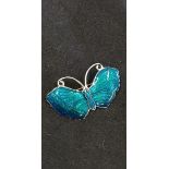 A silver and enamel set butterfly brooch