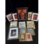 An assortment of mixed artwork including prints and photographs including Indian and Middle Eastern.