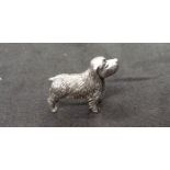 A sterling silver figure of a dog