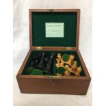 A Jaque London wooden chess set with led weighted bottoms. (full set) all housed in a box barked Sta
