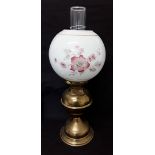 A Victorian style brass oil lamp with hand blown funnel and opaline lampshade.