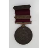 A 1908 Clarnico bronze National Fire Brigades Association Long Service Medal.