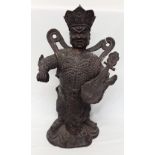 A large Chinese cast metal figure of a musician with a mandolin type instrument.