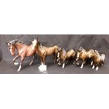 Five Beswick horses including one with matt finish.