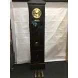 A large longcase clock (grandfather) in mahogany. With the presentation plaque.