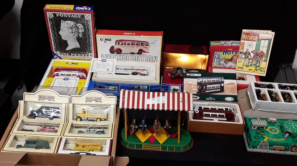 A collection of boxed vintage vehicles together with two tin toys. - Image 2 of 8