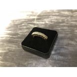 9ct yellow gold half eternity ring set with 7 diamonds. Weight 3.12g. Size N