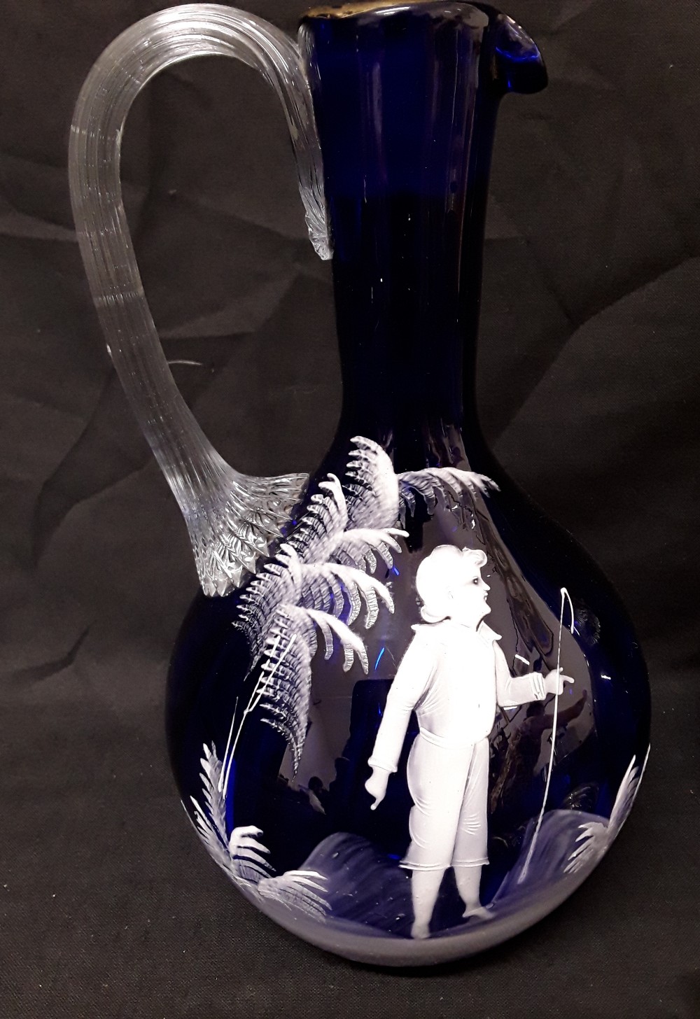 A pair of Mary Scott hand blown blue glass decanters/water jugs decorated with white enamel figures. - Image 5 of 6