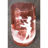 A hand blown and rolled Cranberry glass beaker with hand painted white enamelling.