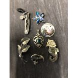 Collection of silver and white metal brooches (6 in total) and a white metal pendant with green agat