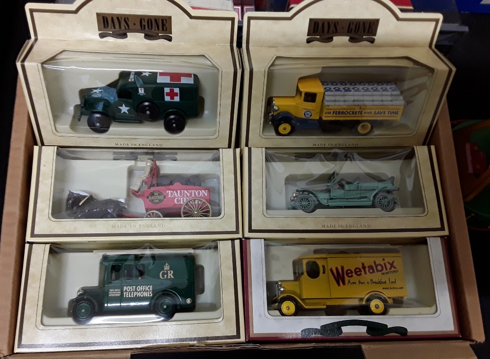 A collection of boxed vintage vehicles together with two tin toys. - Image 3 of 8