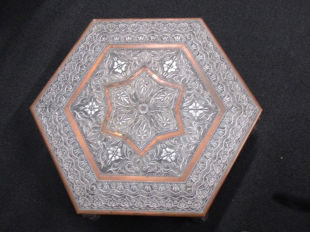 An Indian hexagonal silver wrapped and copper coffee table of small proportions. - Image 2 of 3