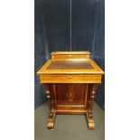A Davenport desk with marquetry inlay and gallery rail to the top.