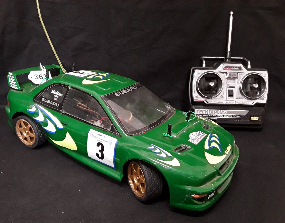 A 1990's Subaru Rally remote control car.