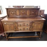 A 1940s (or earlier) copy of a Georgian oak sideboard.