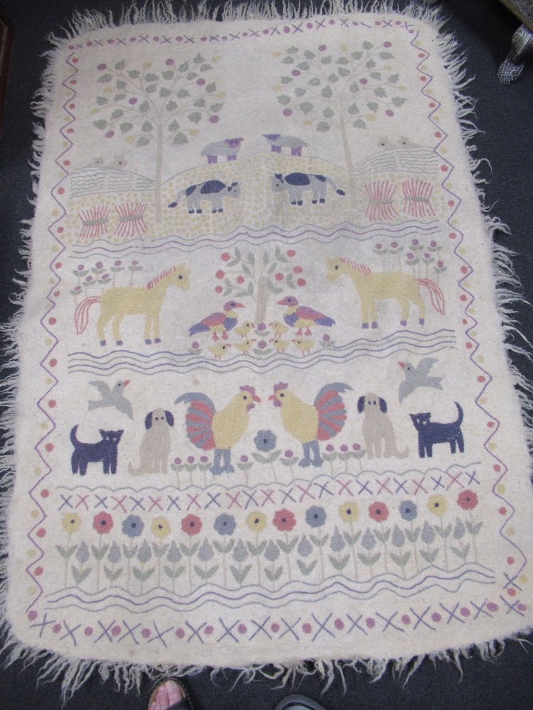 A hand crafted white felted mat/wall hanging beautifully embroidered with animals and flowers. - Image 2 of 3