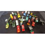 A collection of playworn die cast vehicles including Dinky, Corgi and Matchbox.