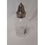 A pretty cut glass crystal and silver plate sugar shaker.