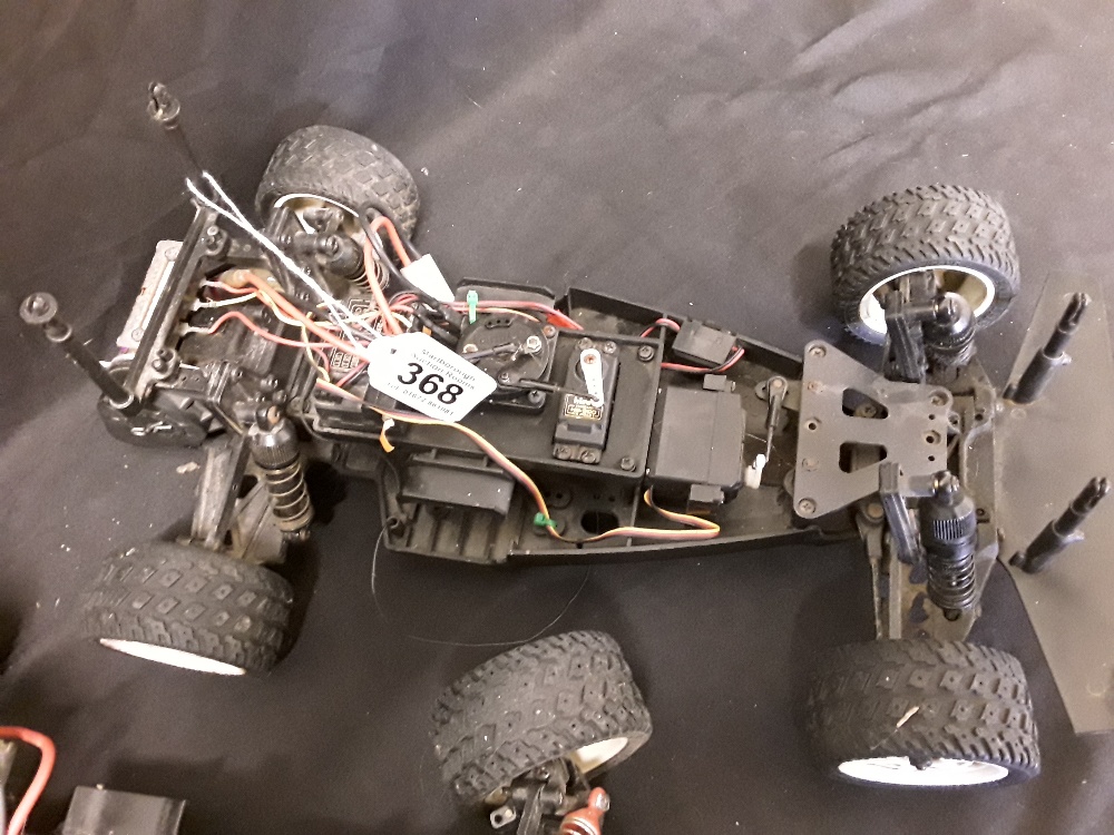 A set of three remote control car chassis including one petrol. - Image 3 of 6