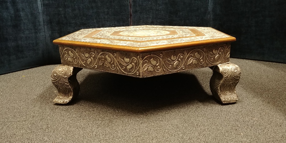 An Indian hexagonal silver wrapped and copper coffee table of small proportions. - Image 3 of 3