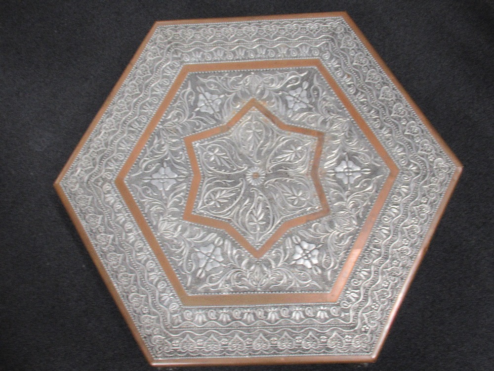 An Indian hexagonal silver and copper wrapped coffee table of larger proportions. - Image 2 of 3