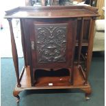 A mahogany cabinet .