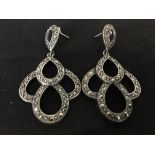 A pair of silver and marcasite drop earrings.