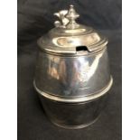 An silver condiment pot hallmarked London 1837 with the original blue glass liner.