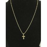 A 18ct yellow gold necklace with an 18ct gold crucifix.