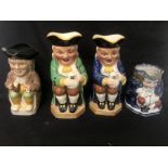 A set of four toby jugs
