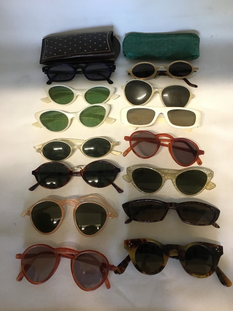 14 pairs of vintage lady's sunglasses including "Cutler and Gross" of London and Kenzo.