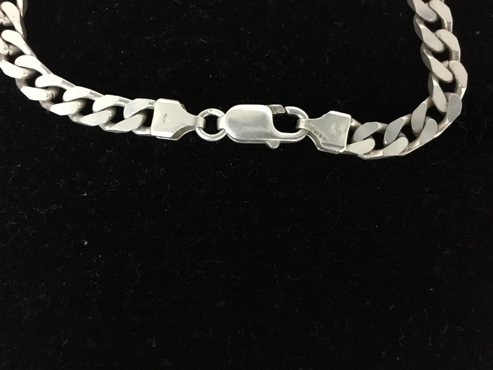 A solid silver curb link bracelet. - Image 2 of 2