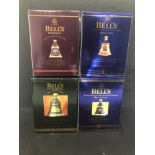 Four bottles of Bells Whisky. All boxed.