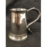 A silver tankard with glass base. Hallmarked London 1914.