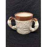 A Brampton Pottery tavern mug circa 1840 with handles modelled as greyhounds
