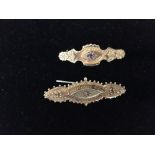 A 15ct yellow gold Victorian bar brooch and a 9ct gold bar brooch.