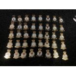 Forty unused Royal Air Force gilt & enamel badge fronts (no pins to reverse).