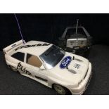 A Tamiya Ford Escort Cosworth Rally battery powered radio controlled car. AF