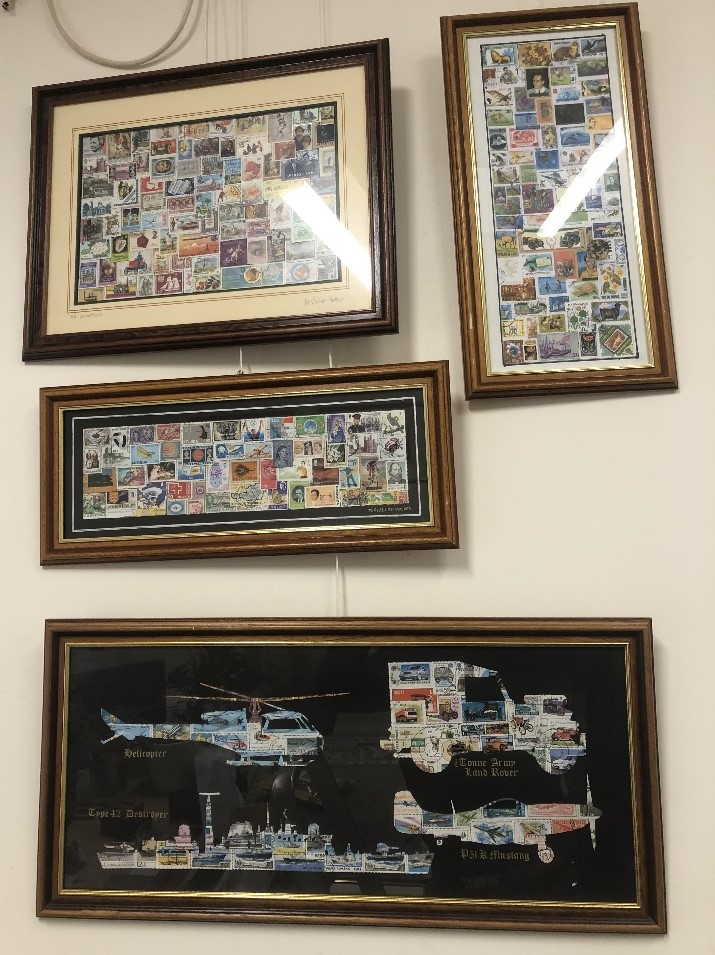 Four framed and glazed stamp collections.