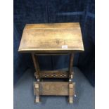 An antique oak lectern Bible prayer stand.