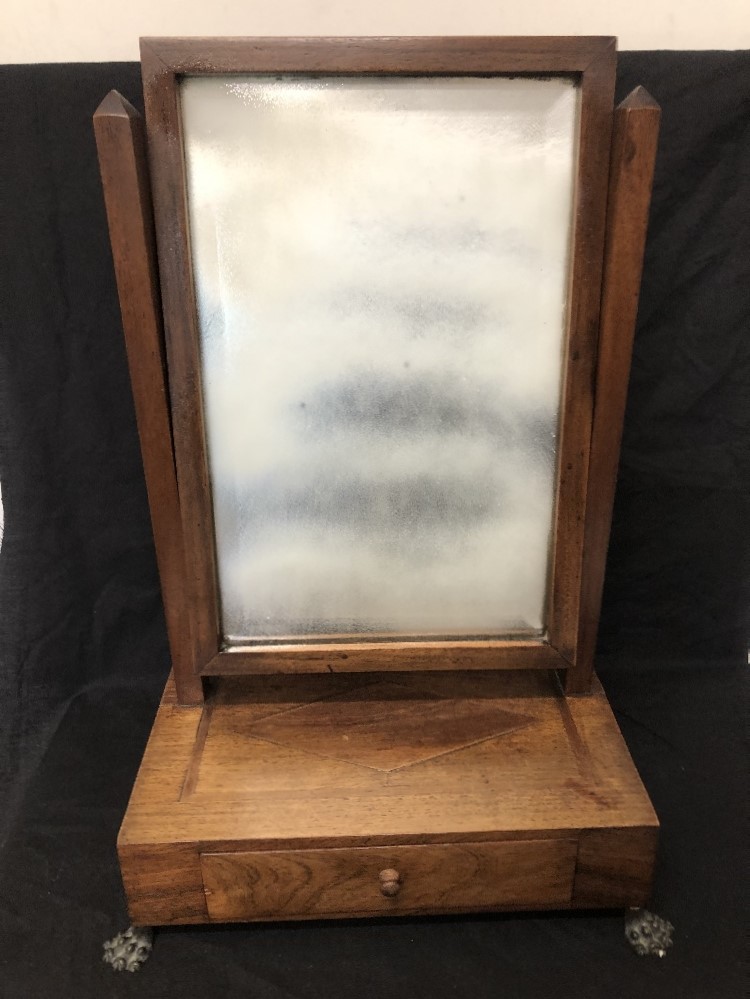 An Art Deco vanity mirror with marquetry inlay to the inside of the drawer.