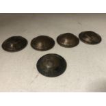 A set of five WW1 trench art Army helmets made from British pennies.