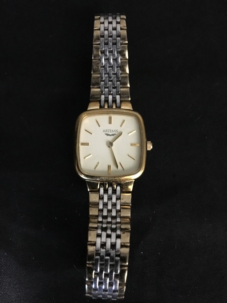 A lady's quartz wristwatch with yellow metal case. By Artemis.