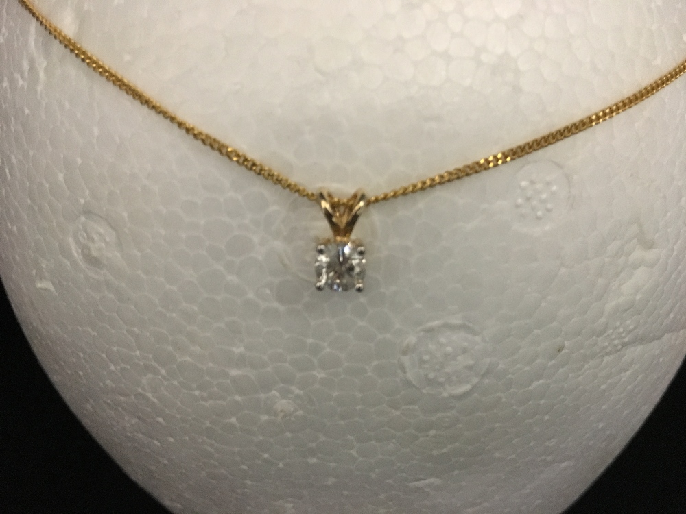 A 9ct yellow gold chain and pendant. The pendant set with a solitaire diamond. - Image 3 of 3