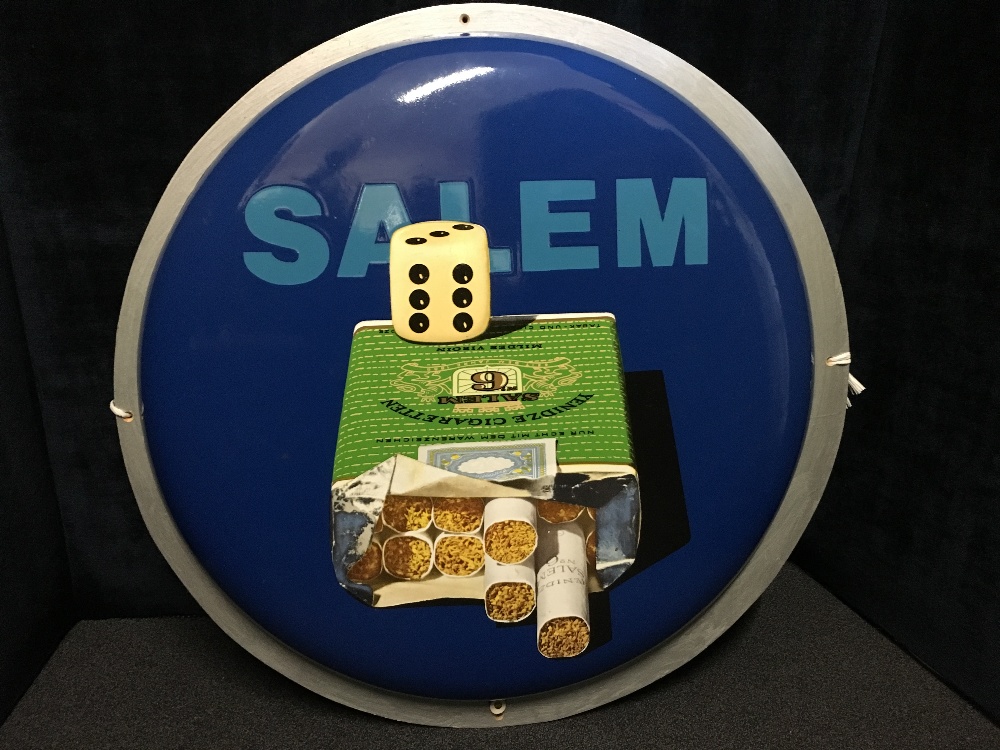 A circular enamelled sign for Salem Cigarettes.