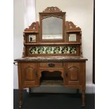 A marble topped washstand with tile back.