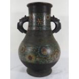 Art d'Asie. Vase pansu en bronze et émaux cloisonnés. Haut. 46 cm (fond accidenté). -