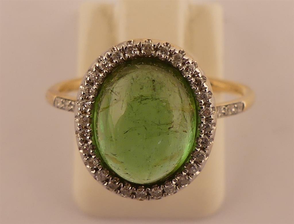 Bague Ovale or 3g10, sertie en son centre d'une Tourmaline verte taille cabochon [...]